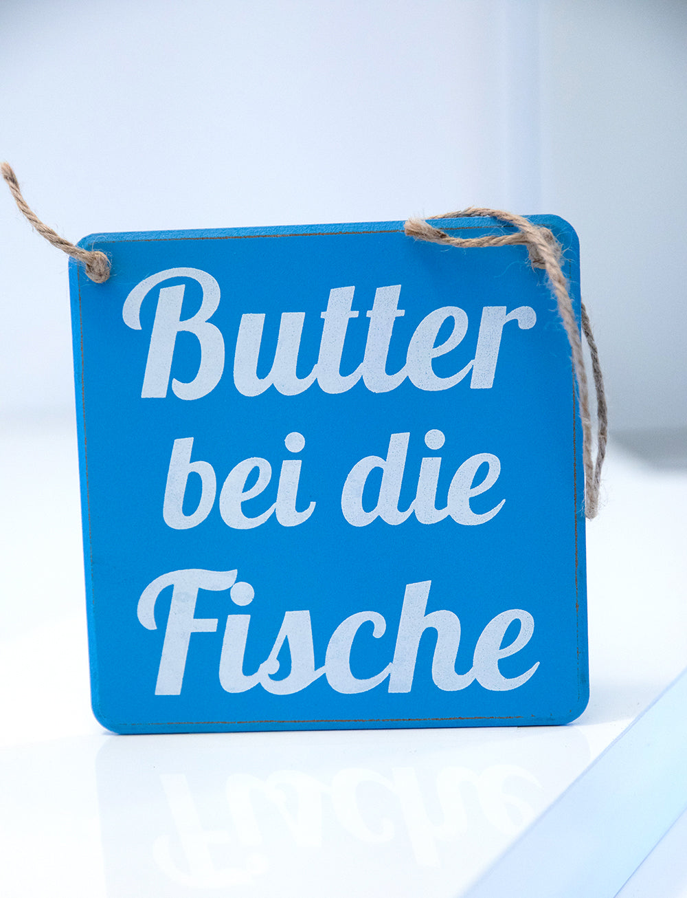Schild: Butter bei die Fische - MOPO-Shop